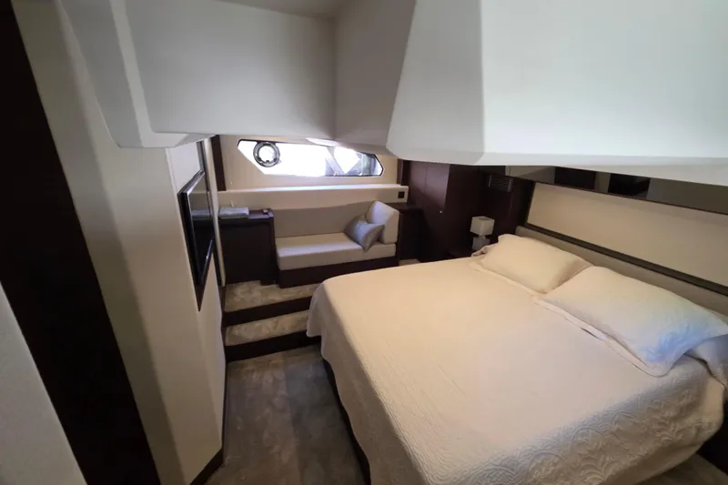 Slide: The Image of Luxurious bedroom interior of 2018 Prestige 460 yacht, featuring a comfortable bed and elegant decor. - 35