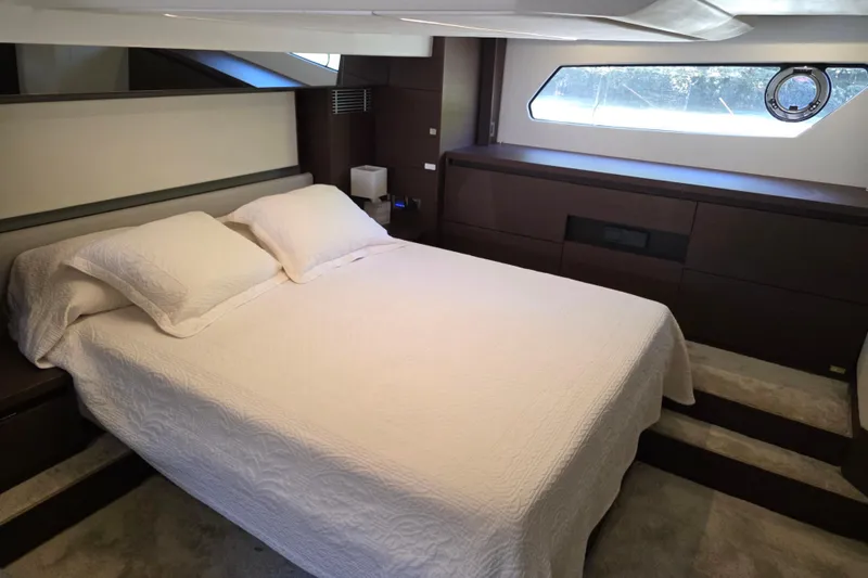 Slide: The Image of Luxurious bedroom interior of 2018 Prestige 460 yacht with elegant bedding and modern design. - 36