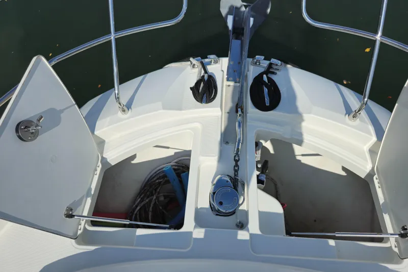 Slide: The Image of Bow of 2018 Prestige 460 yacht with open storage compartments and anchor system. - 5