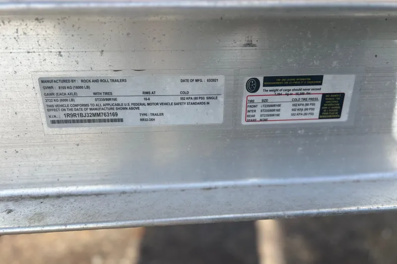 Slide: The Image of Trailer information label showing specifications and tire details for Rock and Roll Trailers, March 2021. - 30