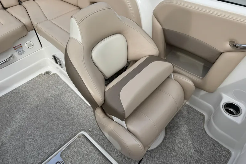 Slide: The Image of Beige and brown seating in 2012 Chaparral 224 Sunesta boat interior. - 16