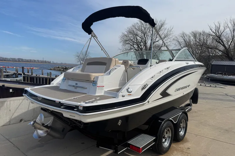 Slide: The Image of 2012 Chaparral 224 Sunesta boat on trailer by waterfront. - 6