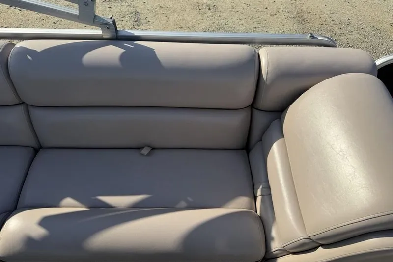 Slide: The Image of Steering console of a 2013 South Bay 422 CR boat with gauges and controls. - 23