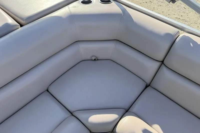 Slide: The Image of 2013 South Bay 422 CR boat seat with light gray upholstery. - 26