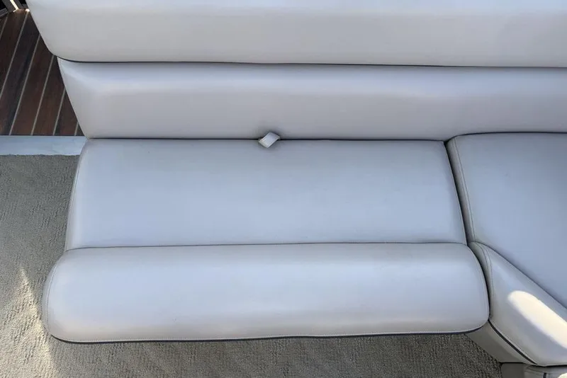 Slide: The Image of 2013 South Bay 422 CR boat interior with beige leather seating. - 27