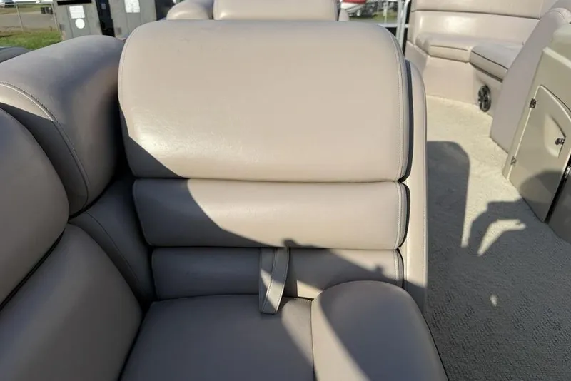 Slide: The Image of 2013 South Bay 422 CR boat interior with beige seating and Yamaha engine. - 28