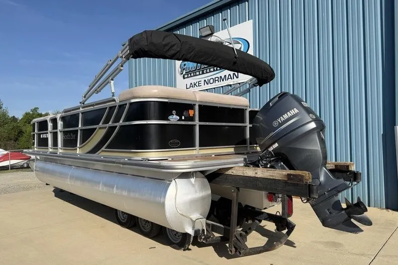 Slide: The Image of Interior of a 2013 South Bay 422 CR pontoon boat with beige seating. - 4