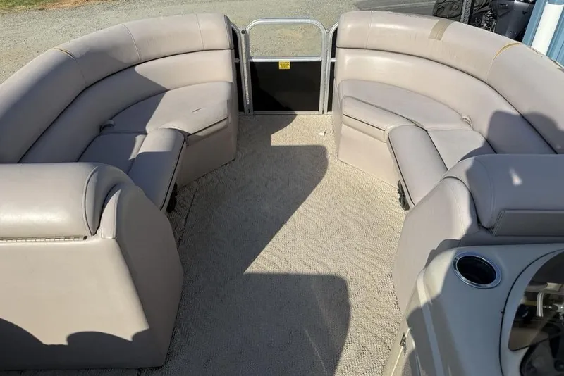 Slide: The Image of Open storage compartment in 2013 South Bay 422 CR boat seat. - 5