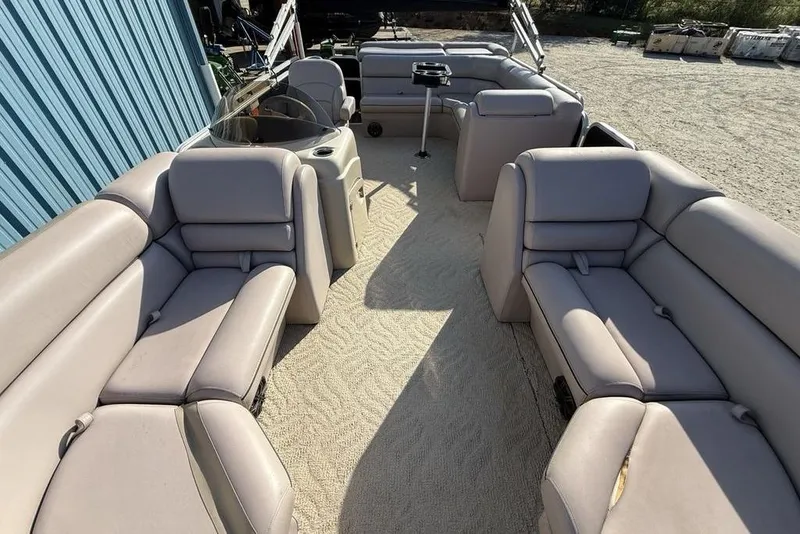 Slide: The Image of Interior of a 2013 South Bay 422 CR boat showing seating and storage compartment. - 7