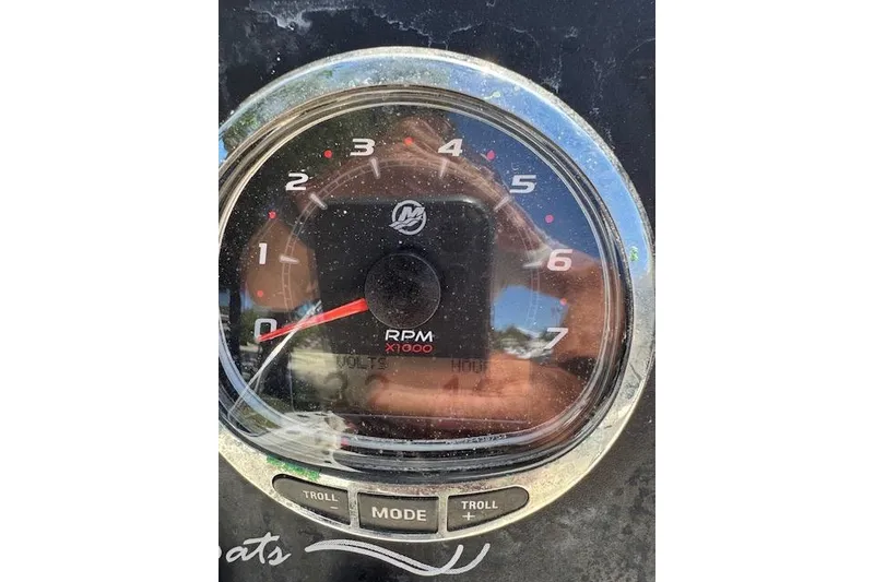 Slide: The Image of Close-up of a Tideline 190 tachometer, displaying RPM gauge and control buttons. - 14