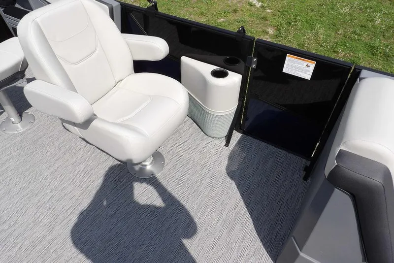 Slide: The Image of Luxurious seating on 2026 Sylvan R-20 PARTY FISH boat with cup holder and safety gate. - 14