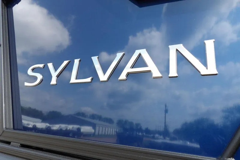 Slide: The Image of Sylvan R-20 PARTY FISH 2026 logo on reflective blue surface with sky reflection. - 30