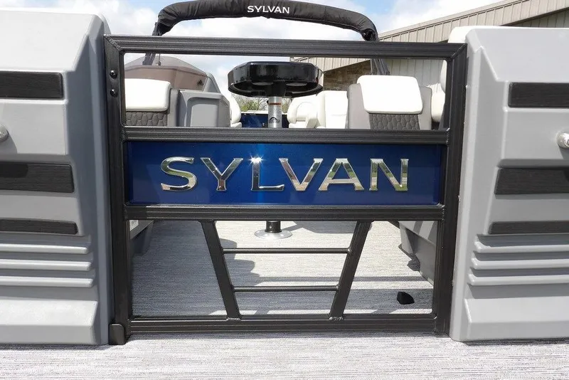 Slide: The Image of 2026 Sylvan R-20 PARTY FISH boat entrance with logo, showcasing sleek design and seating. - 31