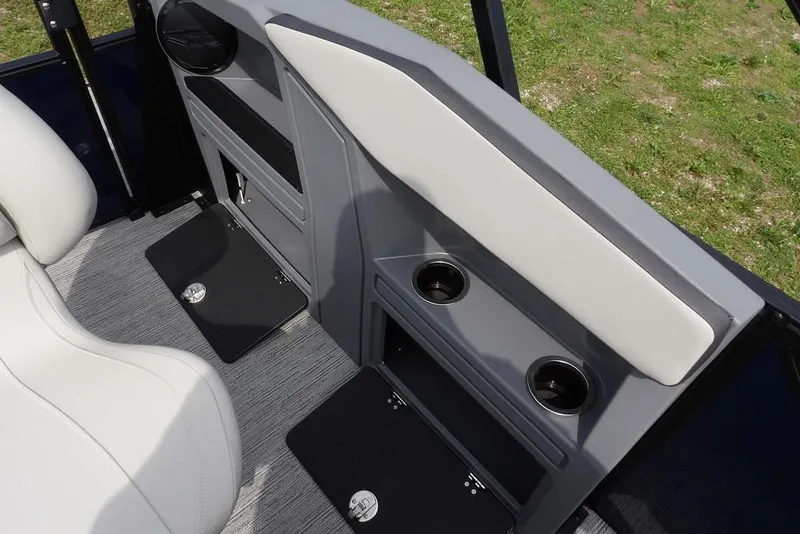 Slide: The Image of Interior of 2026 Sylvan R-20 PARTY FISH boat with seating and cup holders. - 33