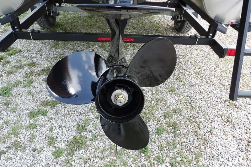 Slide: The Image of Propeller of 2026 Sylvan R-20 PARTY FISH boat on gravel surface. - 37