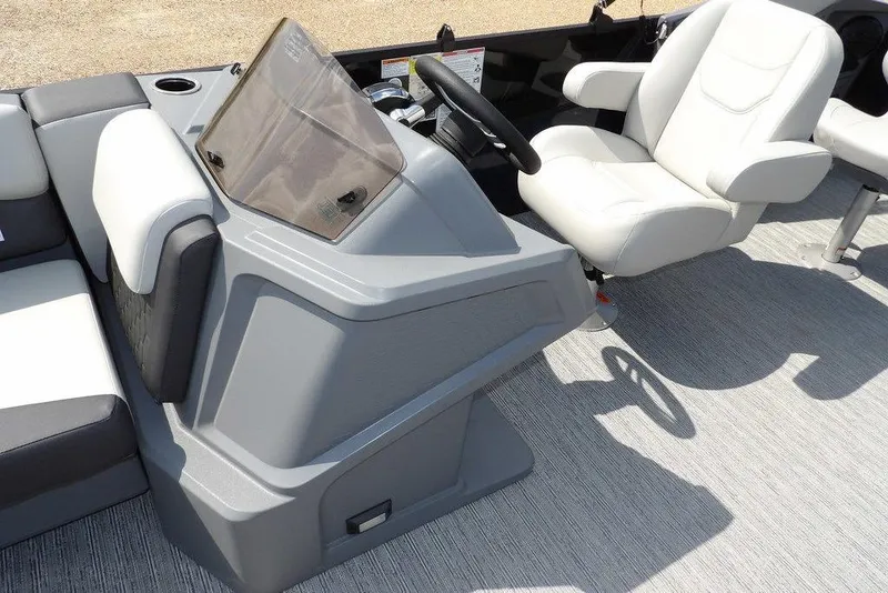 Slide: The Image of Interior of 2026 Sylvan R-20 PARTY FISH boat with modern seating and steering console. - 39