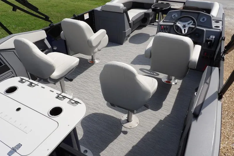 Slide: The Image of Interior of 2026 Sylvan R-20 PARTY FISH boat with seating and steering console. - 43