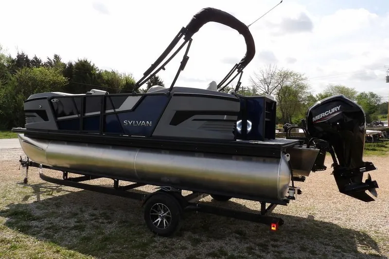 Slide: The Image of 2026 Sylvan R-20 PARTY FISH pontoon boat with Mercury outboard motor on trailer. - 5