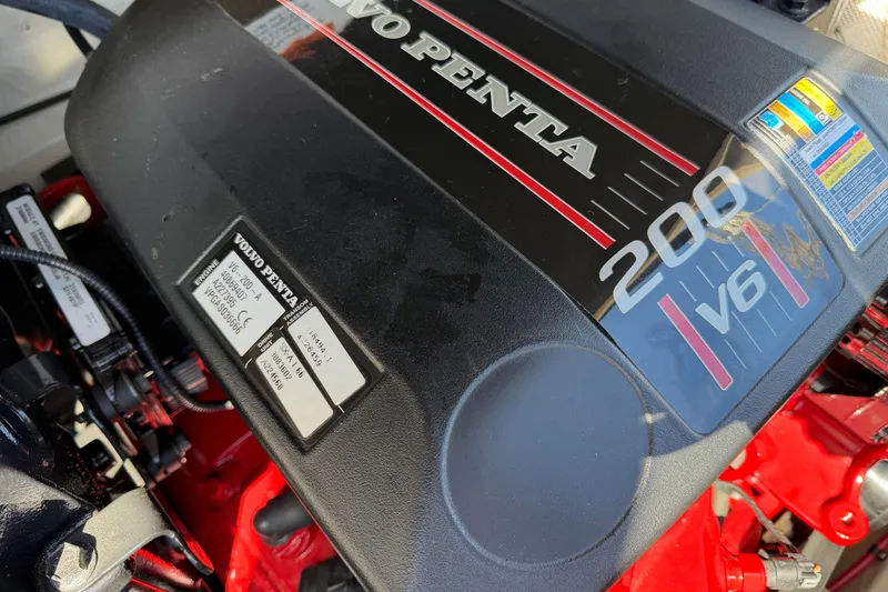 Slide: The Image of Volvo Penta 200 V6 engine in a 2013 Regal 1900 Bowrider boat. - 24