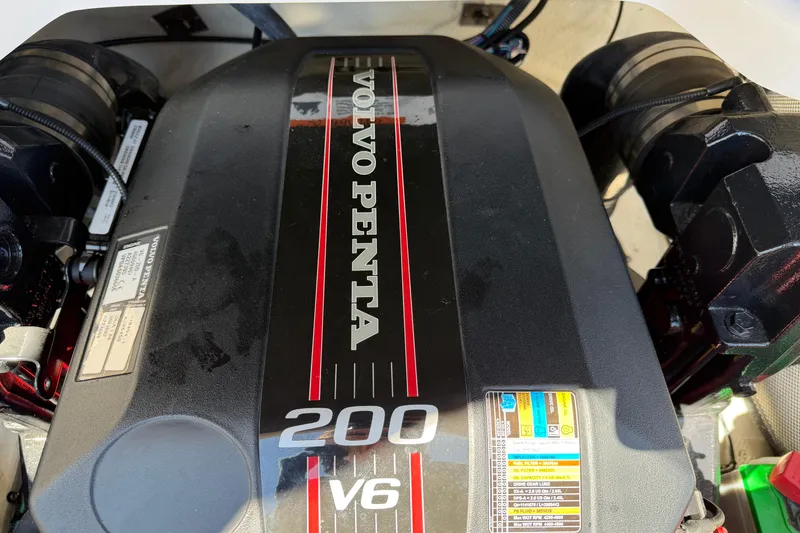 Slide: The Image of Volvo Penta 200 V6 engine in a 2013 Regal 1900 Bowrider boat. - 25
