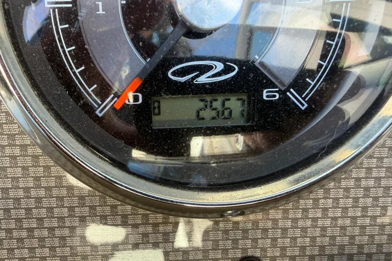 Slide: The Image of Close-up of a Regal 1900 Bowrider 2013 speedometer displaying 2567 hours. - 27