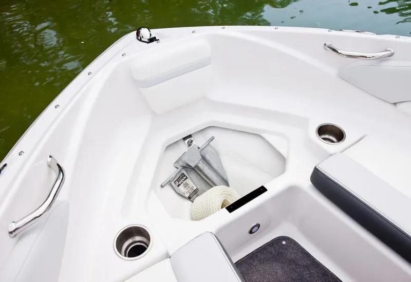 Slide: The Image of Manufacturer Provided Image: 2013 Regal 1900 Bowrider anchor storage compartment with cup holders. - 33