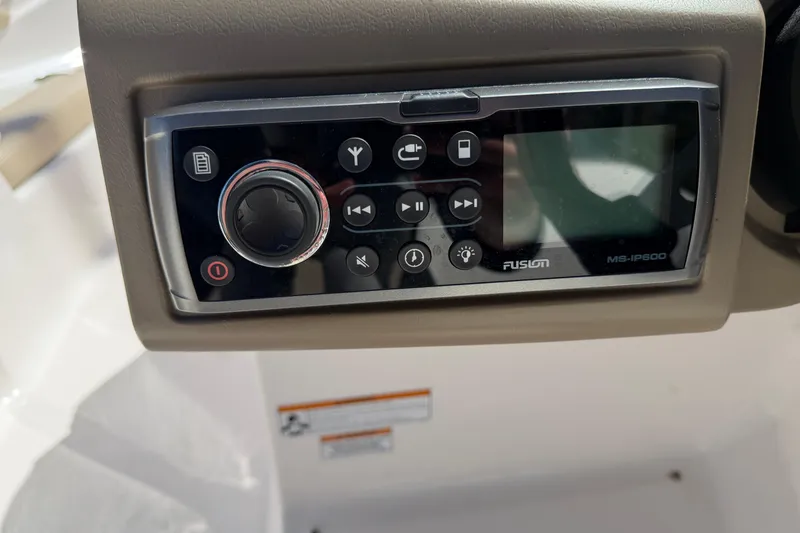 Slide: The Image of Fusion MS-IP600 stereo system on 2013 Regal 1900 Bowrider boat dashboard. - 9