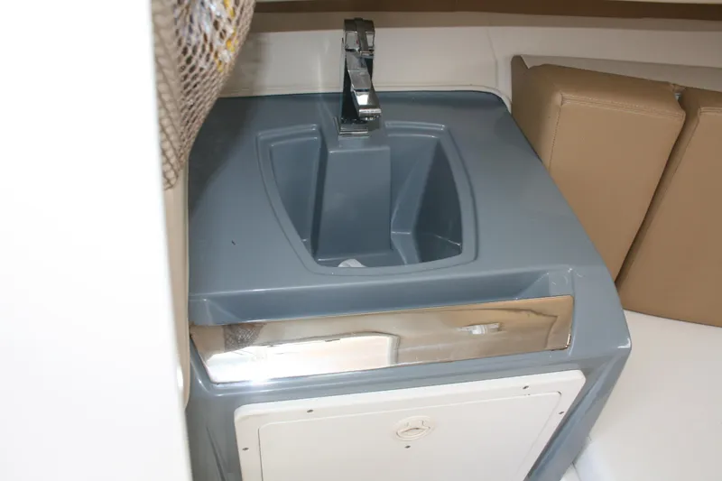 Slide: The Image of Interior sink of 2014 Seaswirl Striper 220 WA boat with modern design. - 16