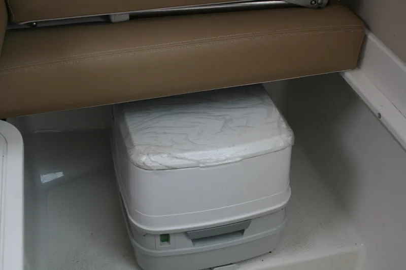 Slide: The Image of Portable toilet under seat in 2014 Seaswirl Striper 220 WA boat cabin. - 19