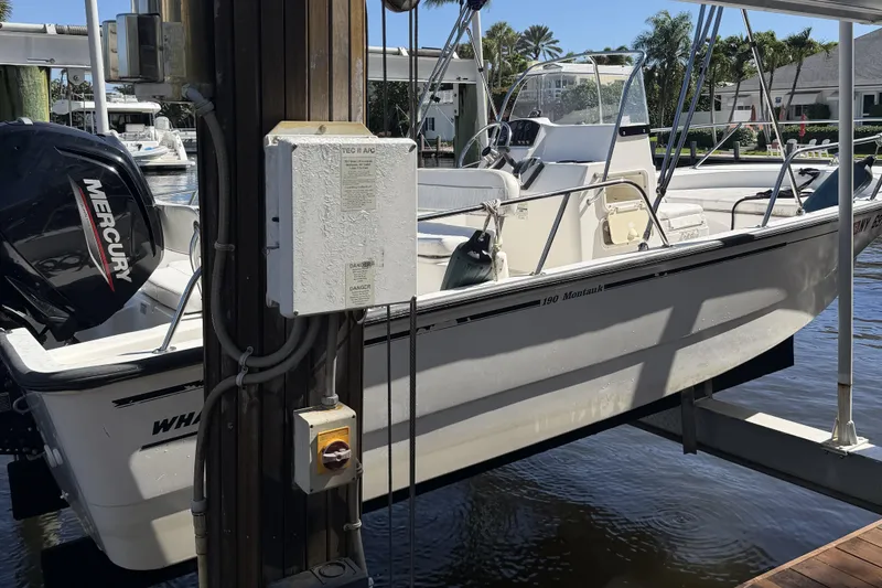 Slide: The Image of 2007 Boston Whaler 190 Montauk boat docked with Mercury engine. - 26