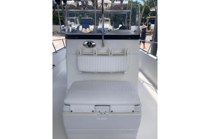 Slide: The Image of 2007 Boston Whaler 190 Montauk boat interior with seating and console view. - 6