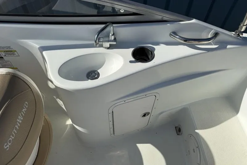 Slide: The Image of 2014 SouthWind 212sd boat interior with sink and seating area. - 29