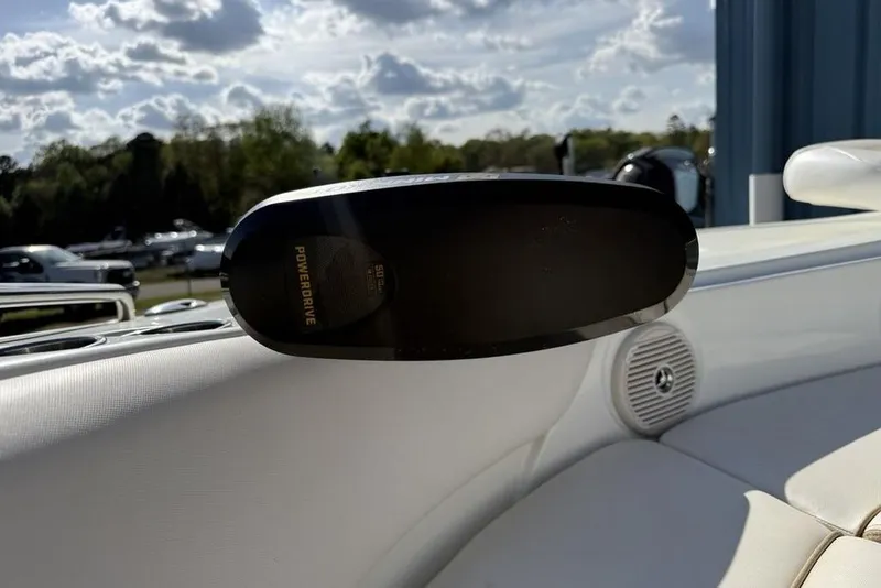 Slide: The Image of 2014 SouthWind 212sd boat interior with PowerDrive speaker, sunny day background. - 31