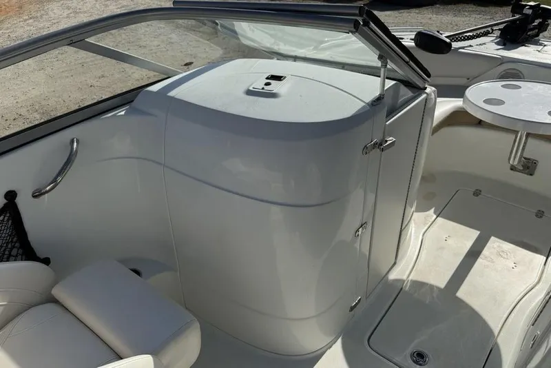 Slide: The Image of 2014 SouthWind 212sd boat interior with seating and table, showcasing sleek design and functionality. - 32