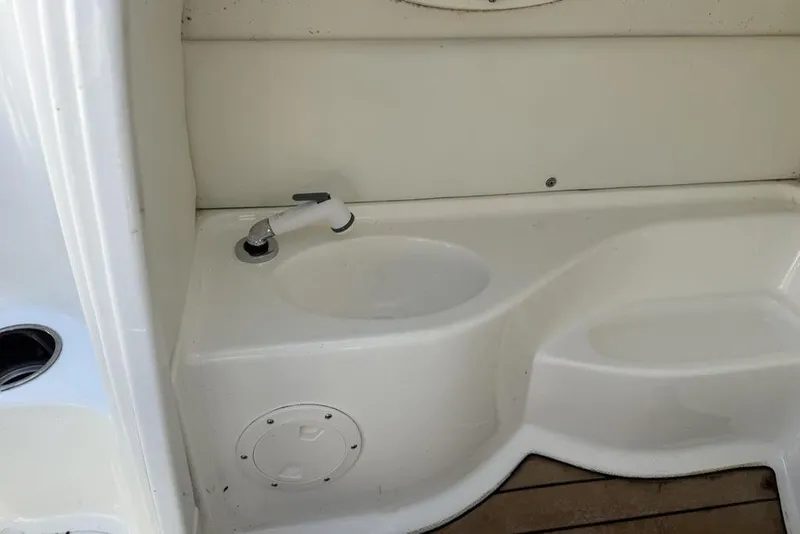 Slide: The Image of Interior view of a 2014 SouthWind 212sd boat sink and faucet area. - 34