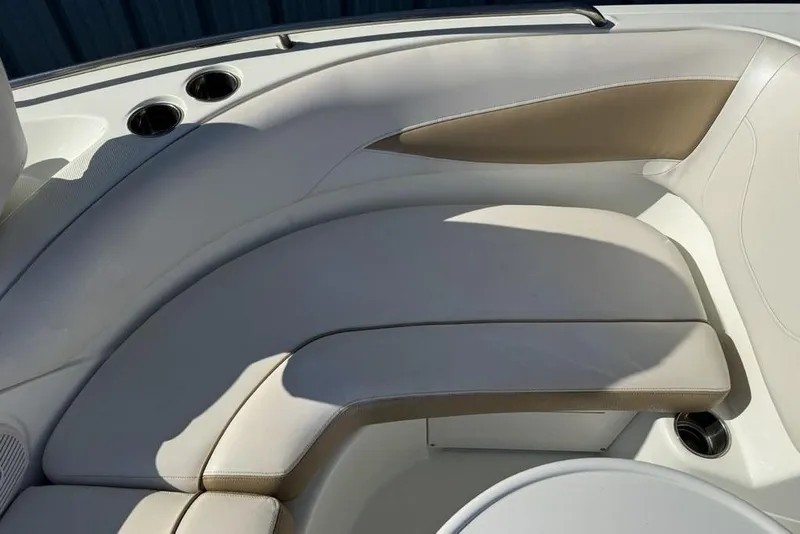 Slide: The Image of Luxurious seating on a 2014 SouthWind 212sd boat, featuring beige and white upholstery. - 37