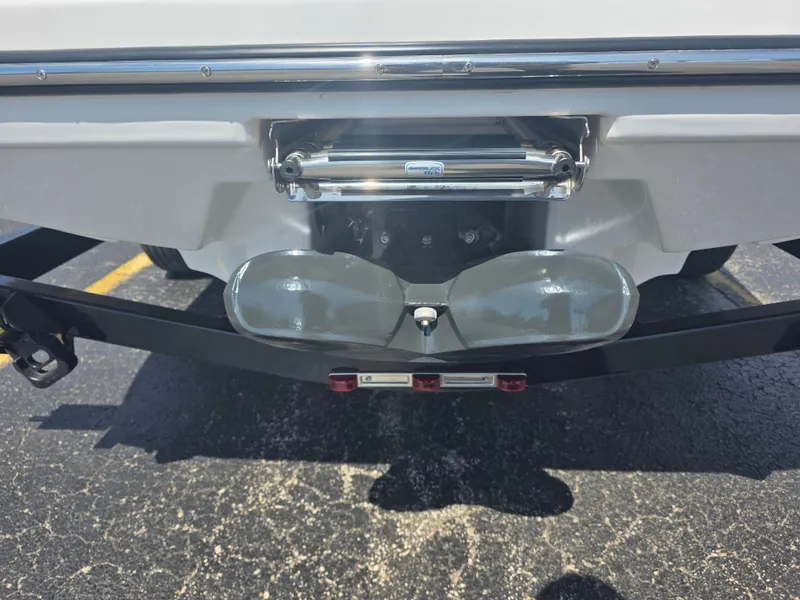 Slide: The Image of Rear view of a 2023 Scarab 195 ID Impact boat. - 5