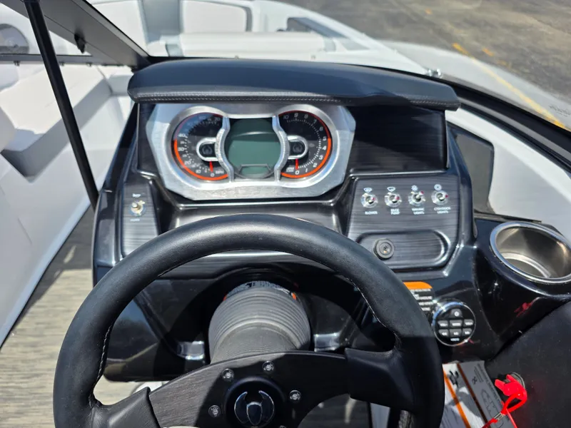Slide: The Image of Dashboard of the 2023 Scarab 195 ID Impact boat. - 8