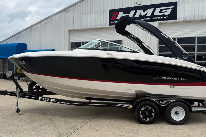 Slide: The Image of 2019 Regal LS4 boat on trailer outside HMG building. - 6