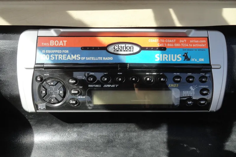 Slide: The Image of Clarion Sirius satellite radio system in 2004 Glastron GX 205 Ski & Fish boat. - 14