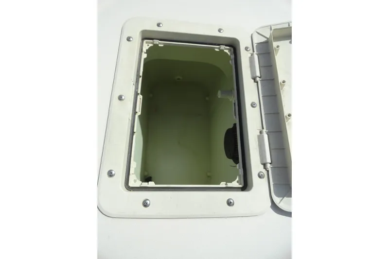 Slide: The Image of Open storage compartment on a 2004 Glastron GX 205 Ski & Fish boat. - 22