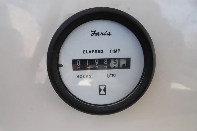 Slide: The Image of Hour meter reading 198.5 hours on 2004 Glastron GX 205 Ski & Fish boat. - 24