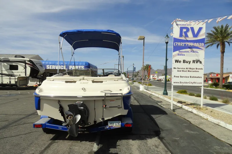 Slide: The Image of 2004 Glastron GX 205 Ski & Fish boat parked near Boulder City RV dealership. - 26