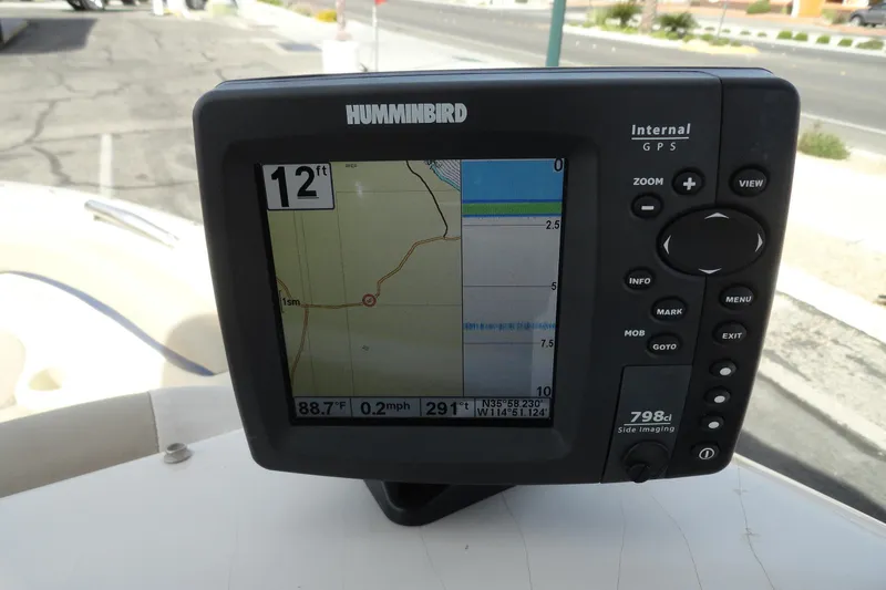 Slide: The Image of Humminbird GPS on 2004 Glastron GX 205 Ski & Fish boat, displaying navigation data. - 9