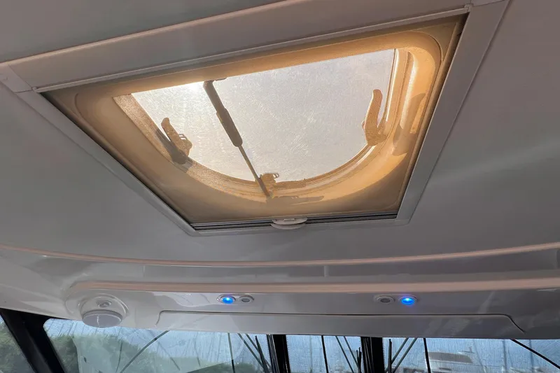 Slide: The Image of 2008 Tiara Yachts 3500 Sovran cabin interior with sunroof and LED lighting. - 19