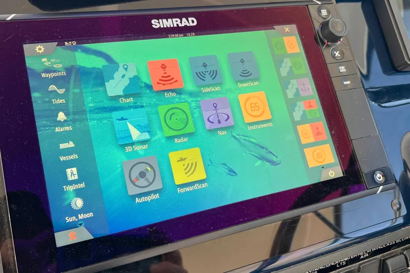Slide: The Image of Simrad marine navigation display on 2008 Tiara Yachts 3500 Sovran, showing various control options. - 26