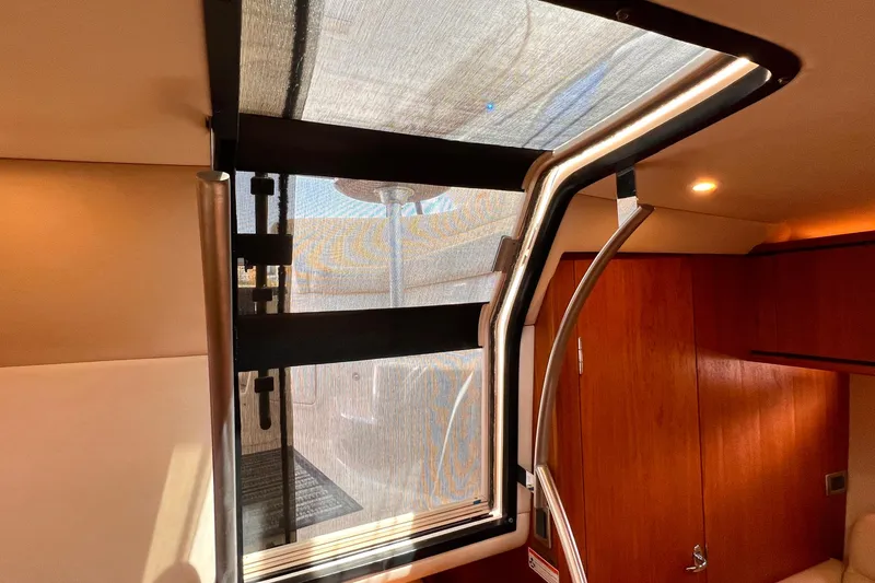 Slide: The Image of Interior view of 2008 Tiara Yachts 3500 Sovran with modern design and natural lighting. - 37