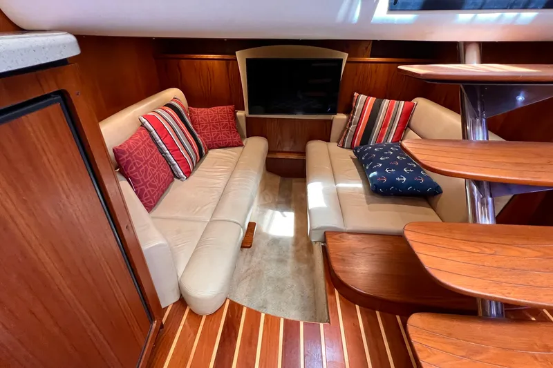 Slide: The Image of Luxurious interior of 2008 Tiara Yachts 3500 Sovran with elegant seating and wooden accents. - 44