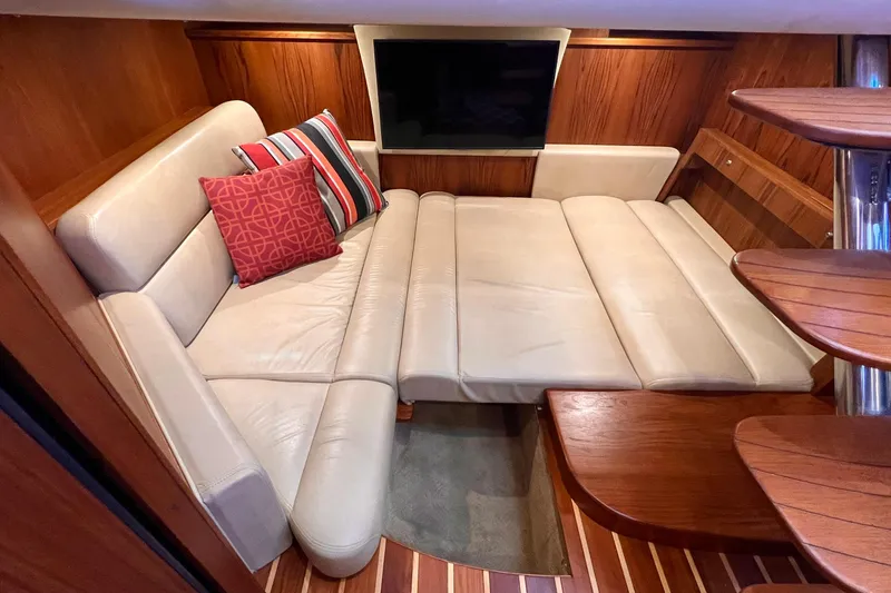 Slide: The Image of Luxurious interior of 2008 Tiara Yachts 3500 Sovran with leather seating and stylish cushions. - 45