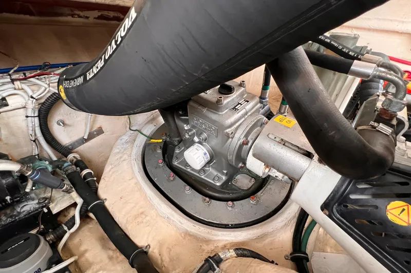 Slide: The Image of Engine compartment of a 2008 Tiara Yachts 3500 Sovran, featuring Volvo Penta components. - 55